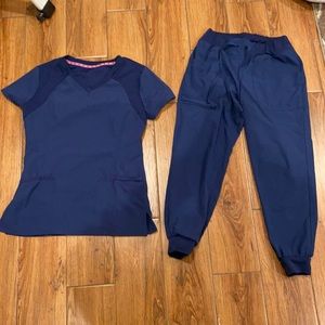 Small top and small joggers. Both have pockets